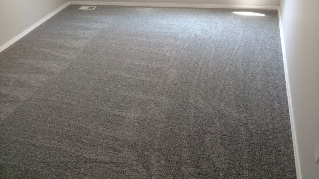 Freshly installed grey carpet in a room by George Babb Floor Covering in Enumclaw, WA.