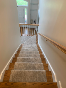A modern grey carpet stair runner installed by The Carpet Workroom in Needham Heights, MA.