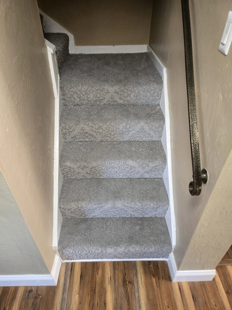 Newly installed grey patterned carpet on stairs by Floor Designs Unlimited, LLC in Pittsburgh, PA