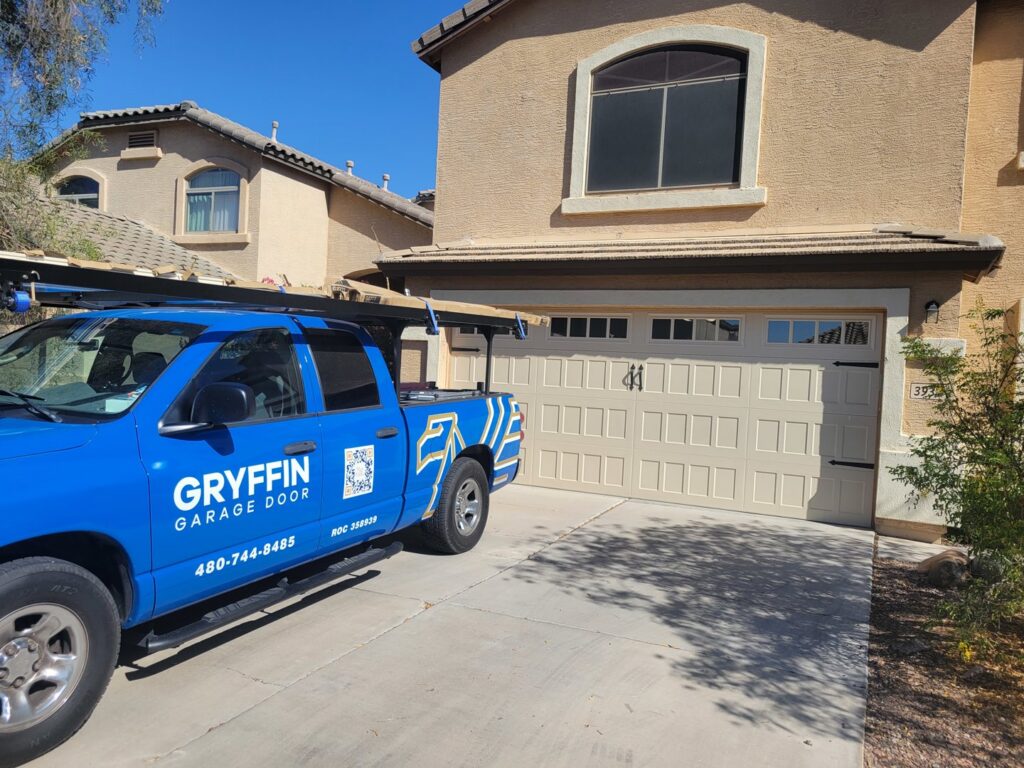 Gryffin Garage Door service truck parked in front of a residential garage, indicating on-site service in Chandler, AZ