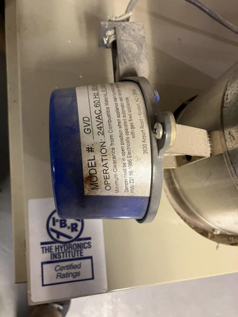 A GVD model damper motor on an HVAC unit with a hydronics certification, maintained by AVS Heating and Air Conditioning in Alexandria, VA.