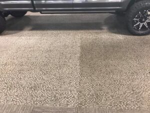 Patterned carpet tiles half-cleaned, showing a significant difference, by Mr. Steamer Carpet Cleaning in Springfield, OR