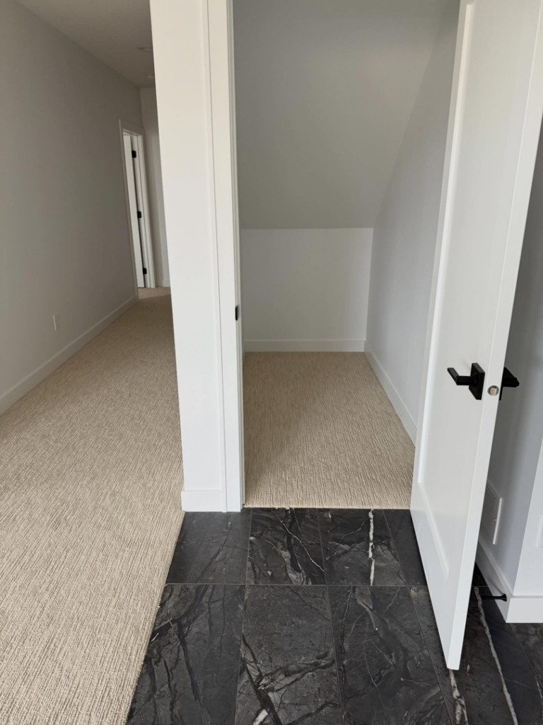 A hallway and an alcove featuring new carpet installation by DeGeus Tile and CarpetsPlus in Rochester, MN