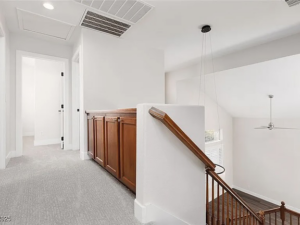 Freshly installed light gray carpet in a residential hallway by Floors by Aldaba LLC in North Las Vegas, NV.