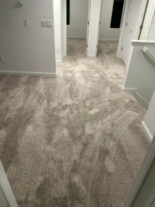 Newly installed grey carpet in a hallway and landing area by Millennium Flooring .Co in Salt Lake City, UT.