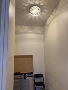 A newly installed ceiling light fixture in a hallway by Crawford Electric Services, LLC in Kings Mountain, NC.