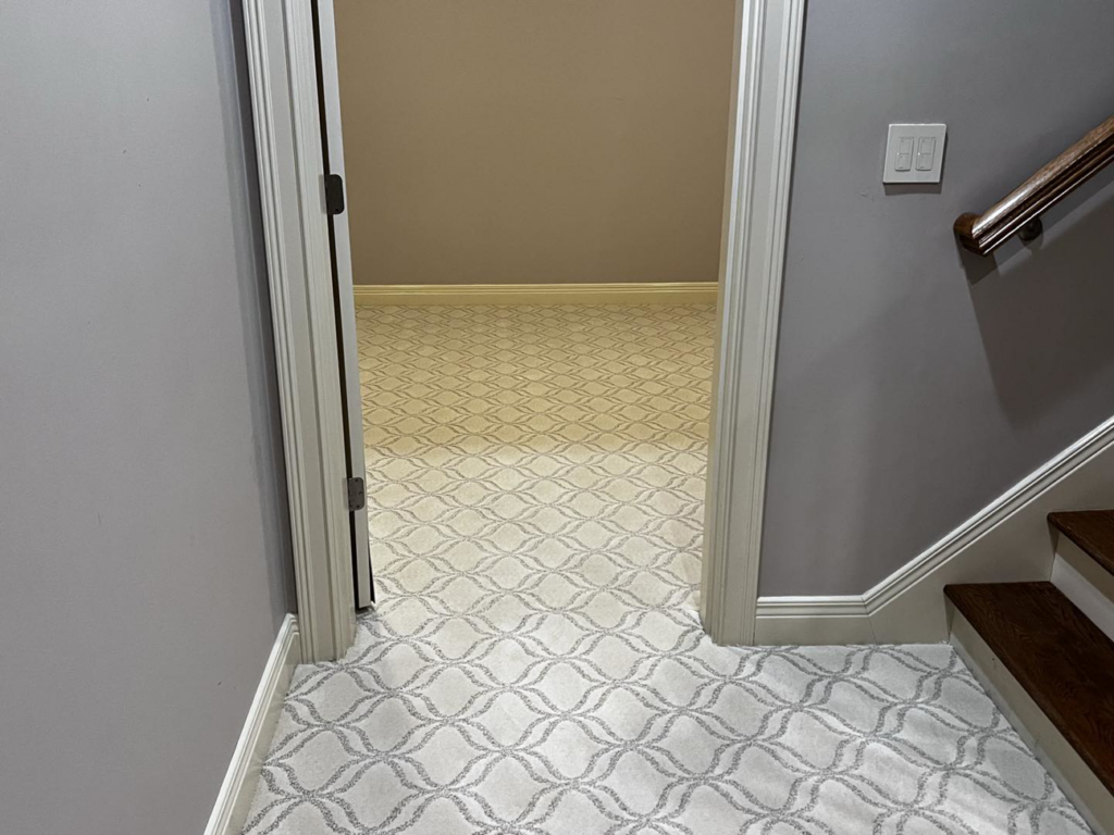 A hallway showcasing a new patterned carpet installation by Kevin's Carpets of Lexington and Georgetown, KY.