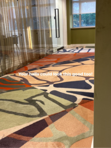 A beautifully installed patterned carpet in a hallway by Positively Perfect Solutions in Roswell, GA.