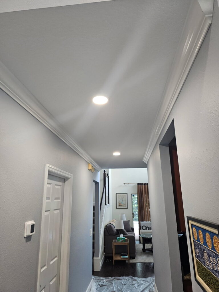 Hallway with modern recessed lighting installed by Everyday Electric in Tampa, FL.