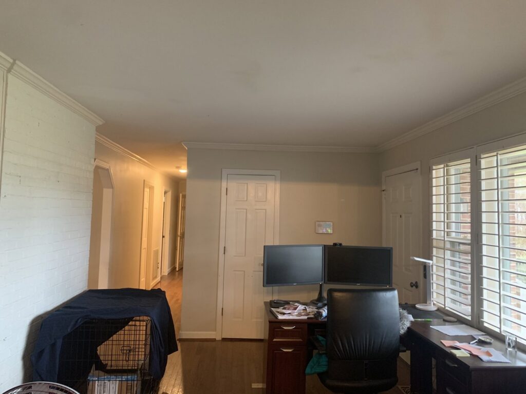 A well-lit hallway featuring modern recessed lighting installed by All Connected Electric LLC in Raleigh, NC.
