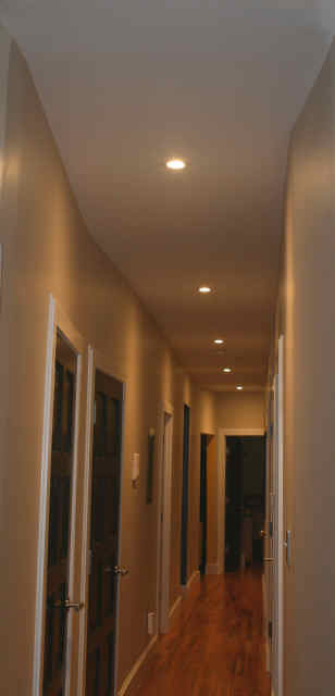 A hallway featuring recessed lighting installed by The Las Vegas Electrician in Las Vegas, NV