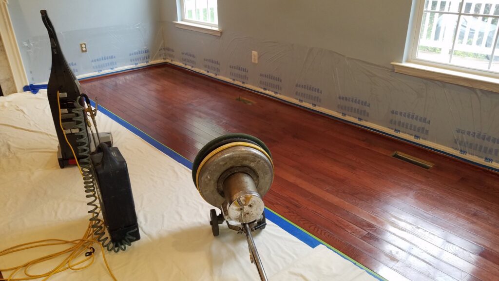 Hardwood floor restoration equipment set up in a room by My Carpet Cleaning & Restoration Services in Silver Spring, MD.