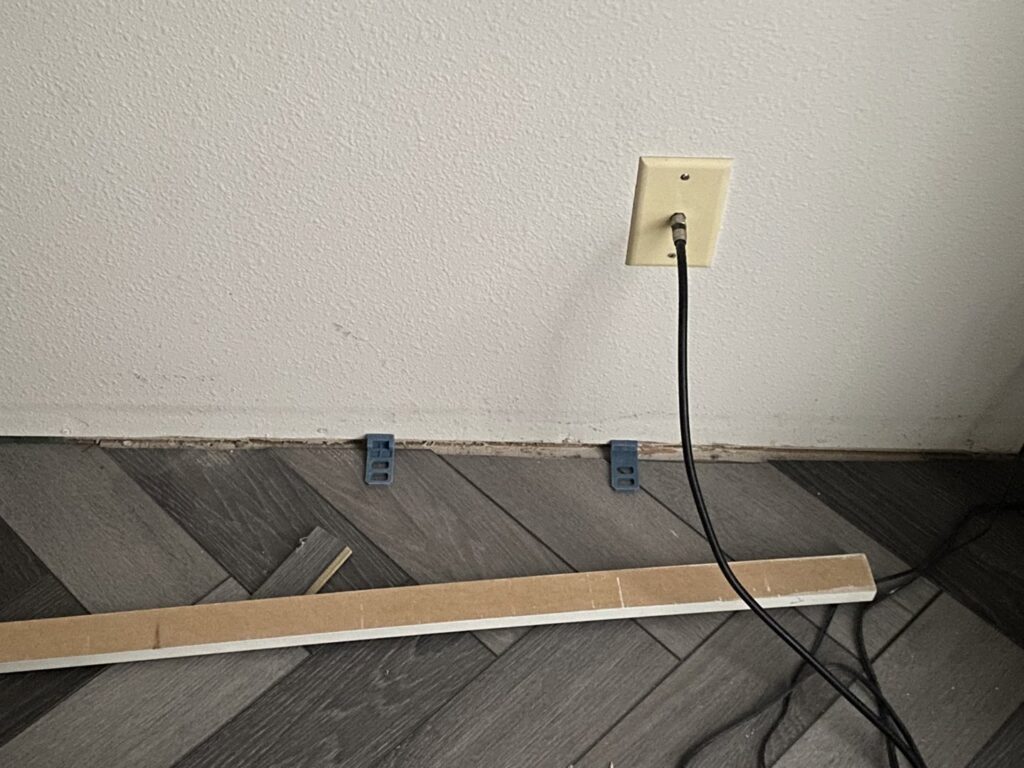 Herringbone pattern flooring installation in progress by Carpet Warehouse and Color Tile in Coeur d'Alene, ID.