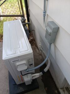 An outdoor Hessaire mini-split condenser unit professionally installed by LUCAS Heating And Air LLC in Salt Lake City, UT.