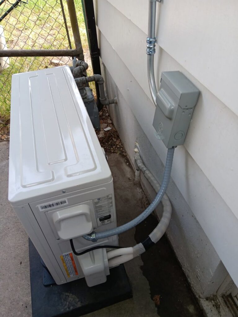 An outdoor Hessaire mini-split condenser unit professionally installed by LUCAS Heating And Air LLC in Salt Lake City, UT.