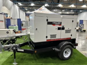 A portable HiPower generator on a trailer, displayed at a trade show by Craig's Electrical and Generator Service in Kenner, LA.