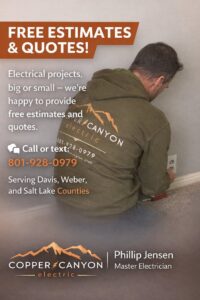 A home electrical panel with the cover removed, displaying the circuit breakers and wiring during an inspection by Copper Canyon Electric in Farmington, UT.