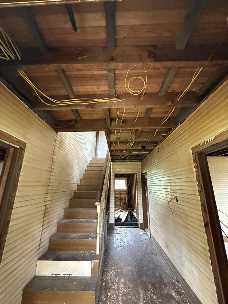 Exposed yellow electrical wiring during a home renovation project by Power House Electrical LLC in Johnson City, TN