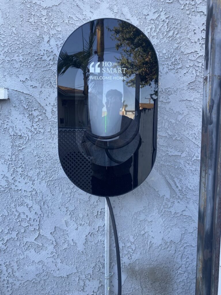 A residential EV charger installed on an exterior wall by CLB Electric Corporation in Norwalk, CA