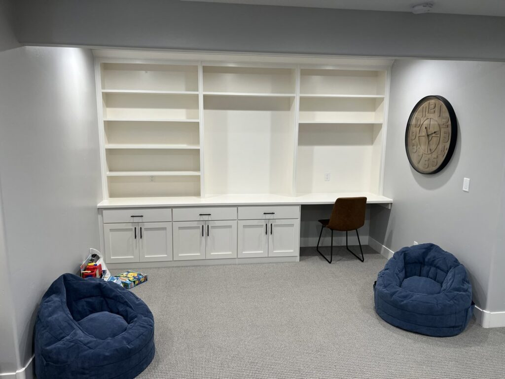 A home office or study room with new wall-to-wall carpet installed by Universal Flooring in Idaho Falls, ID.