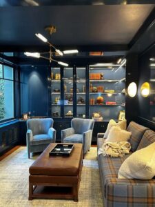 Home office with a modern chandelier, wall sconces, and illuminated shelves installed by R.C Electric, Inc. in San Francisco, CA