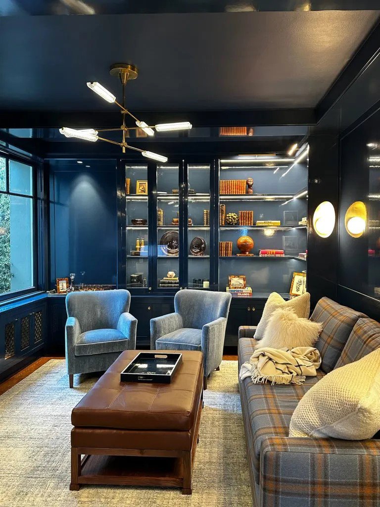 Home office with a modern chandelier, wall sconces, and illuminated shelves installed by R.C Electric, Inc. in San Francisco, CA