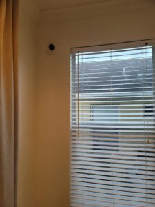 A home security camera installed near a window by Wirenut Technologies LLC in Brandon, FL