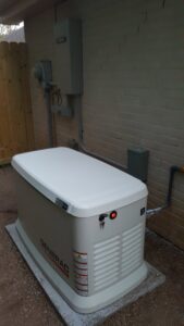 A home standby Generac generator installed on a concrete pad by Peace Of Mind Services in Sag Harbor, NY