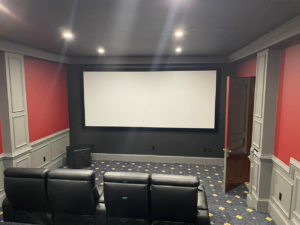 Recessed lighting and wall outlets in a home theater installed by Heritage Electric in Bluffton, SC.