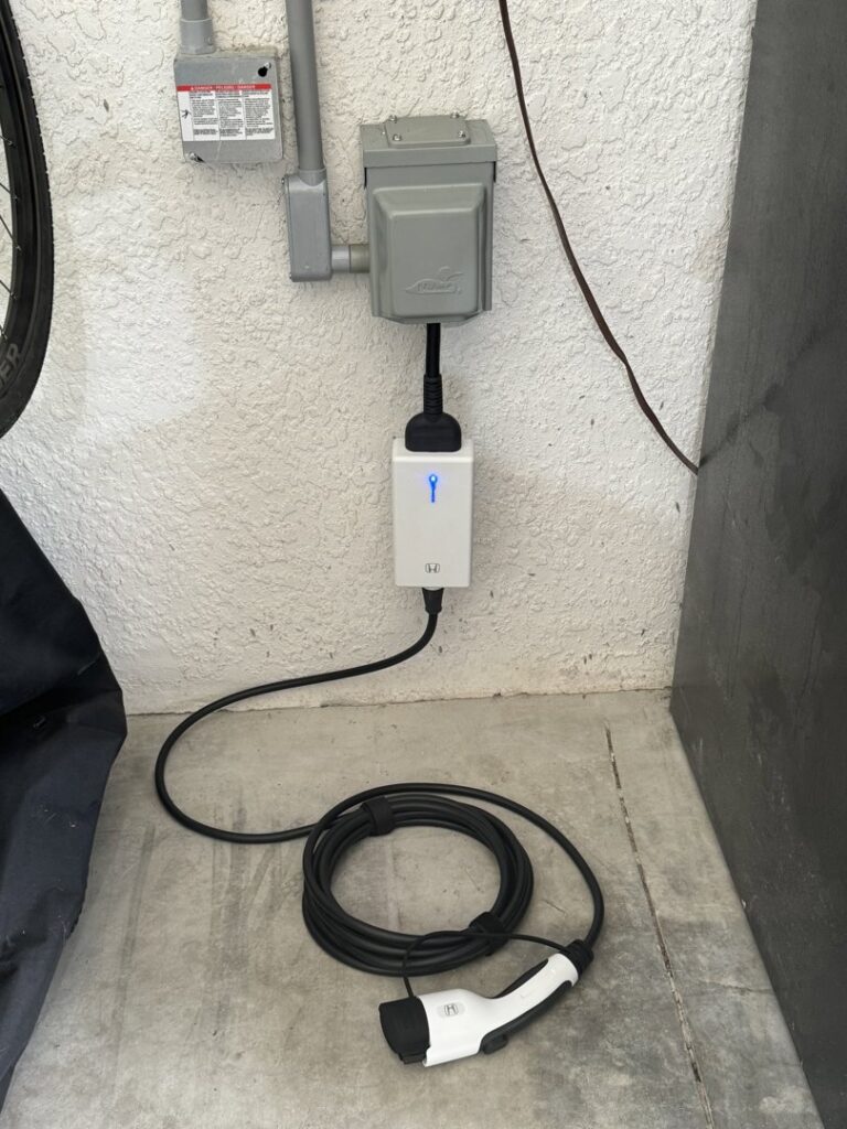 A Honda EV charger installed for electric vehicle charging by Dynamic Electric in Cape Coral, FL.