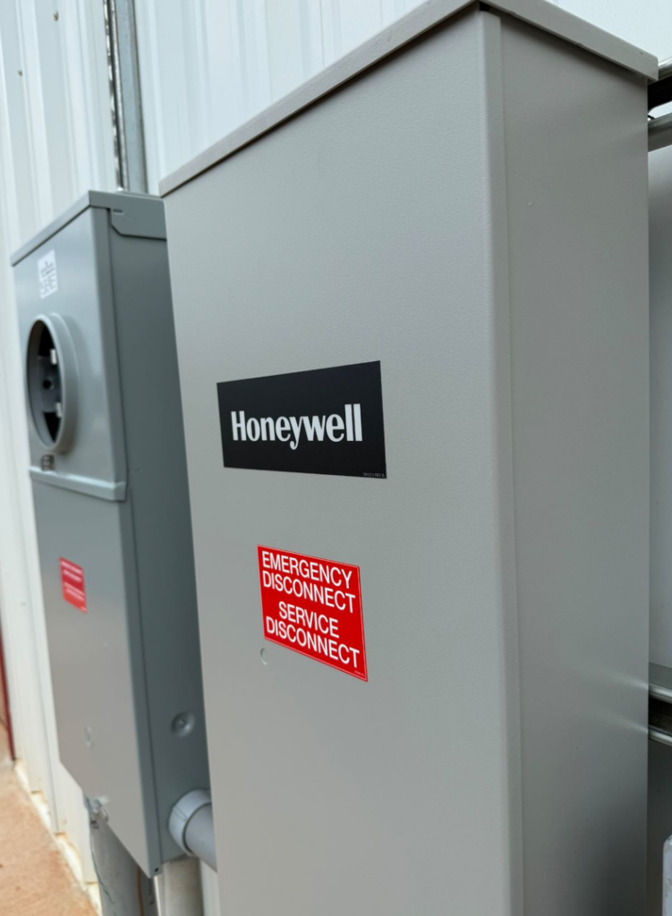 Honeywell emergency disconnect electrical boxes installed on a building by C.A Electrical & More in Greenville, SC.