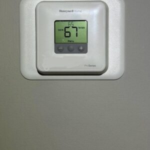 A Honeywell Home ProSeries thermostat displaying temperature settings, installed by Hodges Heating & Cooling in Owensboro, KY.