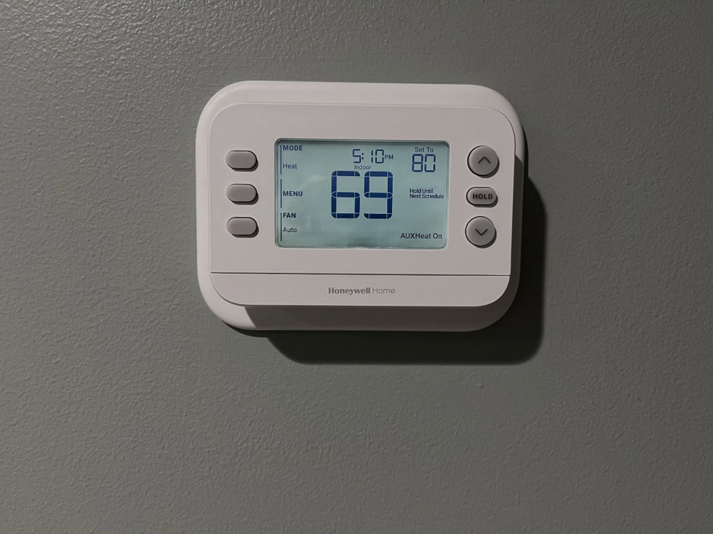 A Honeywell smart thermostat installed on a wall by Joe's Heating & Air Repair LLC in Surf City, NC