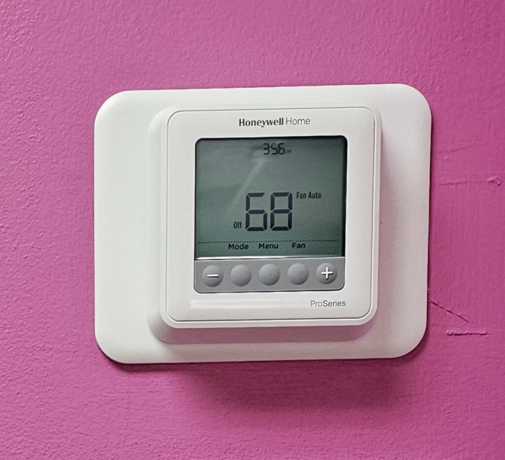 A Honeywell Home smart thermostat displaying 68 degrees, installed by Lighthouse HVAC, LLC in Edgewater, MD.