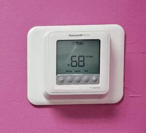 A Honeywell Home smart thermostat displaying 68 degrees, installed by Lighthouse HVAC, LLC in Edgewater, MD.