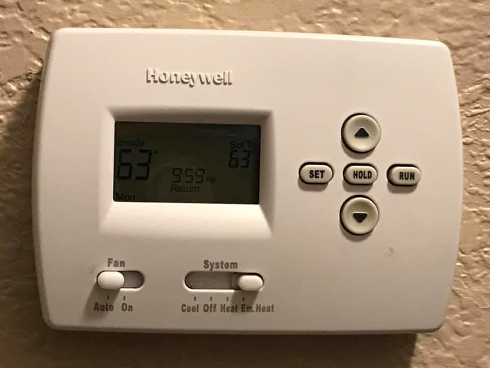 A Honeywell thermostat displaying temperature, serviced by Tropic Air and Heat in Vero Beach, FL