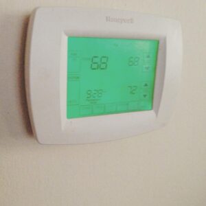 A Honeywell thermostat displaying temperature settings, installed by Brimhall Maintenance Services in Cordova, TN