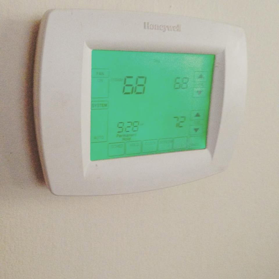A Honeywell thermostat displaying temperature settings, installed by Brimhall Maintenance Services in Cordova, TN