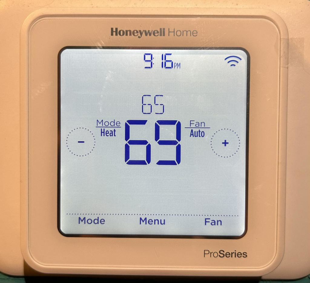 A Honeywell Home ProSeries thermostat displaying settings, installed by Heat Pump Pros in Hartford, CT.
