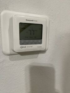 A Honeywell thermostat installed by True Heating and Cooling for precise climate control in Northeast Westminster, CO.