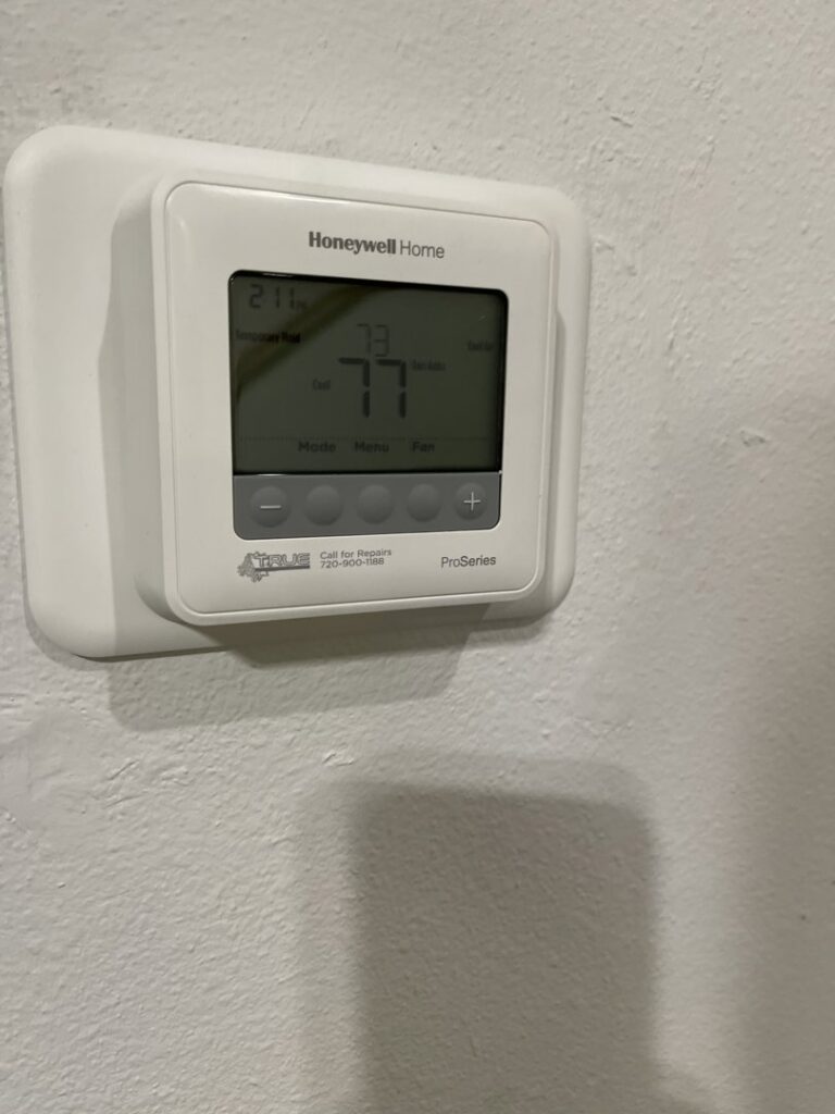 A Honeywell thermostat installed by True Heating and Cooling for precise climate control in Northeast Westminster, CO.