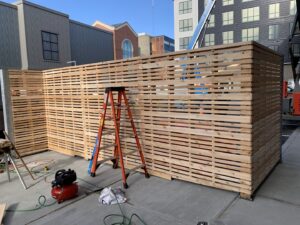 Horizontal slat wood fence under construction by Louis Fence installations & repairs in Fall River, MA