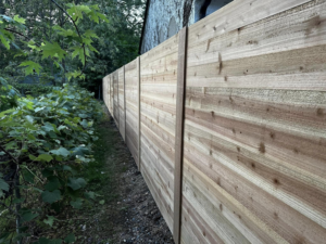 A close-up view of a newly installed horizontal wood privacy fence by CDM Home Solutions in Columbus, OH.