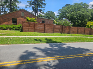 A newly installed horizontal wood slat fence by Fence & Custom Gatework LLC in Columbia, SC