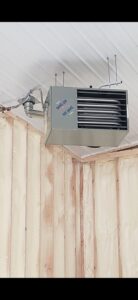 A 'Hot Dawg' garage heater installed on a ceiling by Preferred Heating & Air in Bismarck, ND.