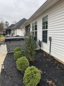 Exterior view of a house with a hot tub and visible electrical wiring installed by Shocking Solutions in Knoxville, TN.