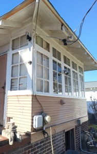 Exterior view of a house showing an electrical meter and service entrance installed by Elemental Electrical in Chattanooga, TN.