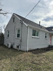 The exterior of a residential house showing electrical conduits and wiring installed by Stricklen Electrical Industries LLC in Clarksville, TN.