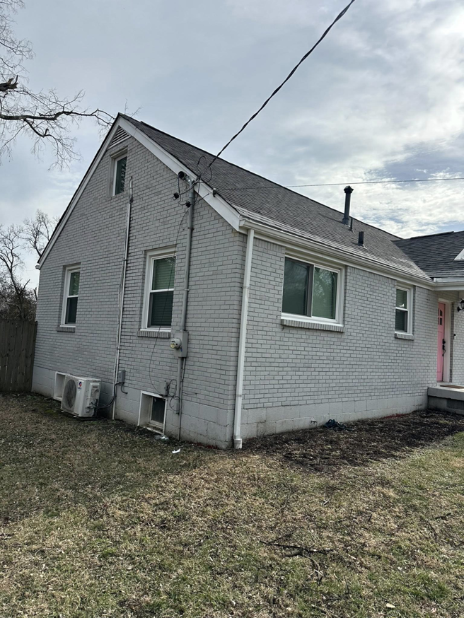 The exterior of a residential house showing electrical conduits and wiring installed by Stricklen Electrical Industries LLC in Clarksville, TN.