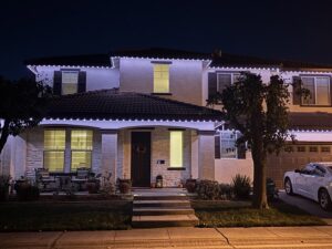 A house exterior featuring permanent holiday lighting installed by The Lighting Geek in Sacramento, CA.